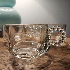 Arlas Orchard Clear Glass Teacup with Beaded Handle